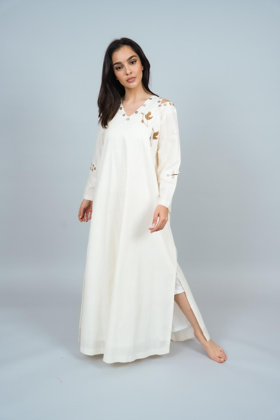 Bird and mother of pearl dress