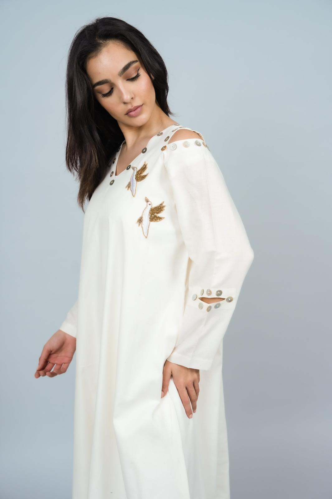 Bird and mother of pearl dress